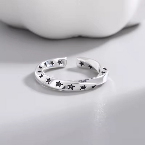 Damenring mit schwarzem Stern, Sterling-Silber 925, offene Größe.