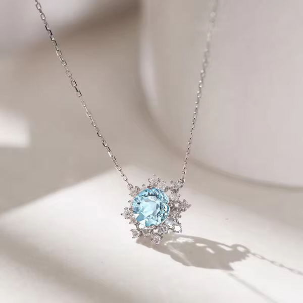 Damen Halskette mit blauem Zirkonia, Silber 925, Sonnenblumen-Anhänger.